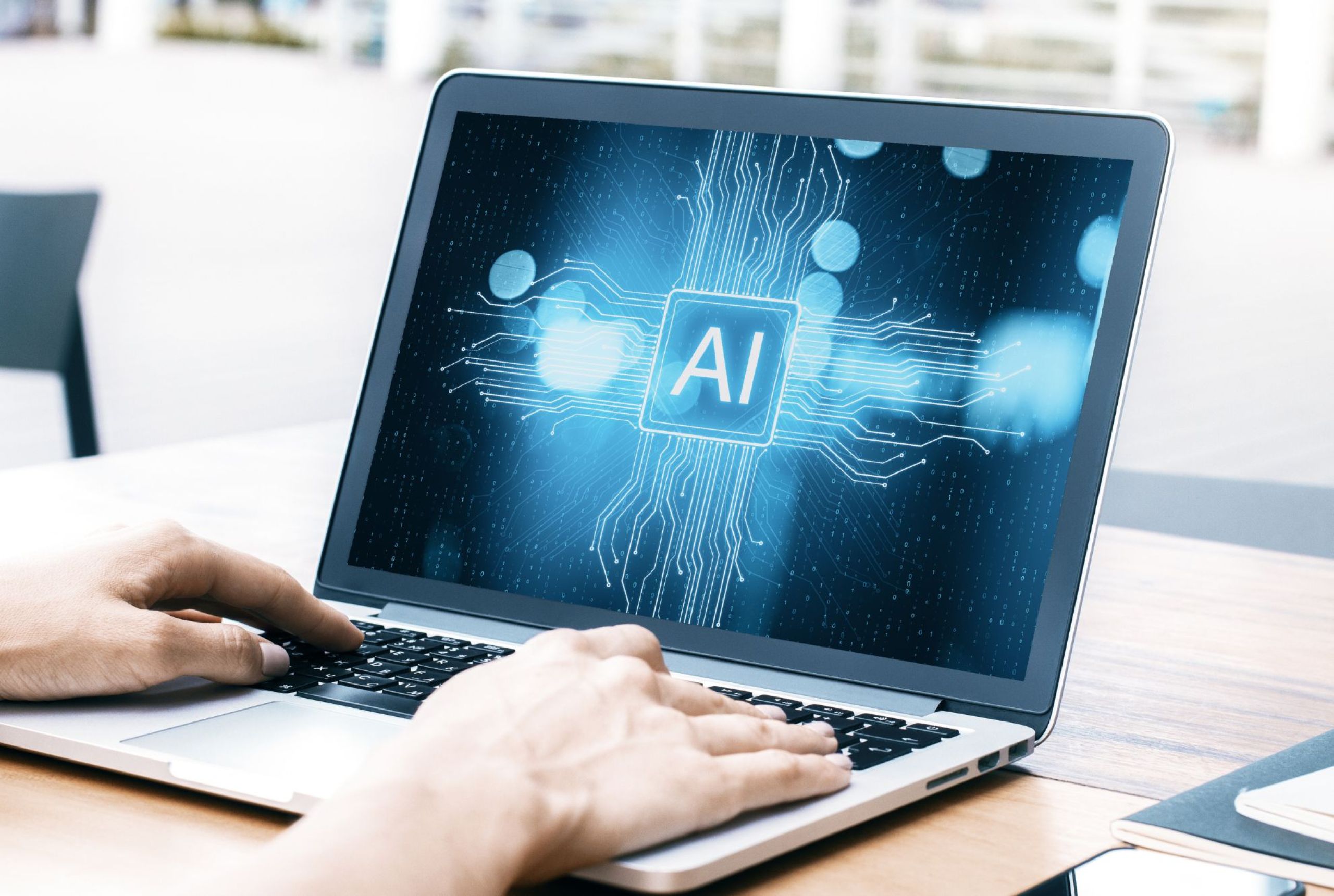 Computer con scritta AI